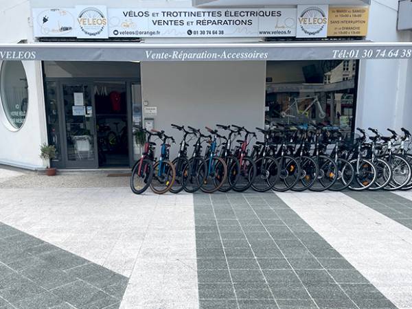 Véléos - Vélos et trottinettes electriques